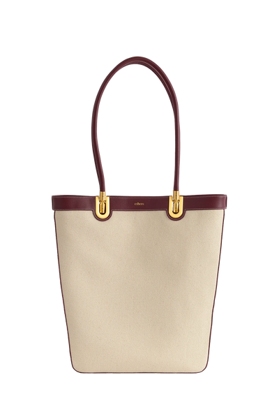 Spacious designer tote bag with shoulder straps in rich caramel brown, crafted from durable high-grade nylon with leather trim accents, the ultimate statement piece for fashion-forward wardrobes and effortless everyday wear.
