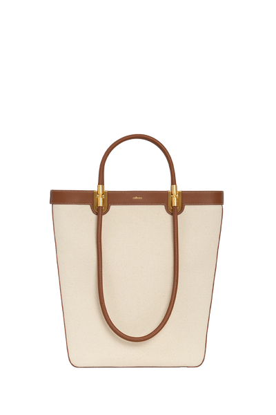 Premium designer bag in rich caramel brown, crafted with refined craftsmanship and high-quality materials, an essential luxury accessory offering versatile style, durability, and practical organization.