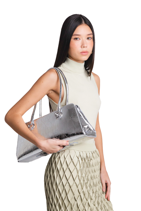Sophisticated crossbody bag with adjustable strap, featured in a compact structured silhouette with premium zipper closure, expertly designed with structured compartments and lightweight durable fabric for modern living.